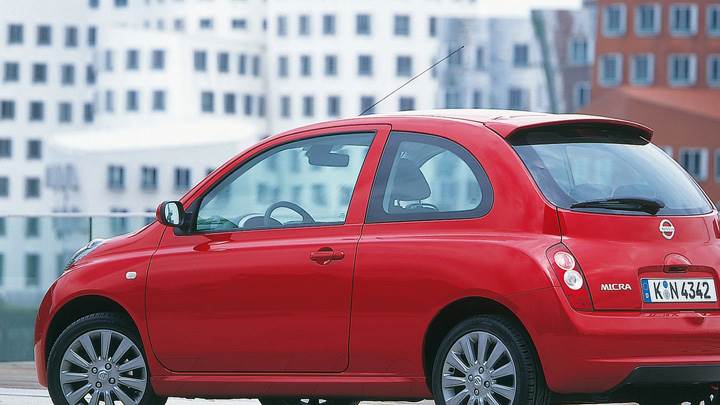 Nissan Micra Side Pose In Red At 25th Anniversary